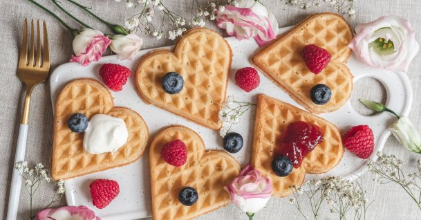 Homemade waffles in the shape of hearts. (Shutterstock Photo)
