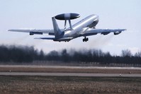 A NATO Airborne Warning and Control System (AWACS) aircraft take off during the Lithuanian - NATO air force exercise at the Siauliai Air Base some 230 kilometers east of the capital, Vilnius, Lithuania, April 1, 2014. 