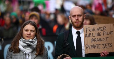Greta Thunberg joins Extinction Rebellion in protesting private jet flight expansion at Farnborough Airport, England, Jan. 27, 2024. (AFP Photo)