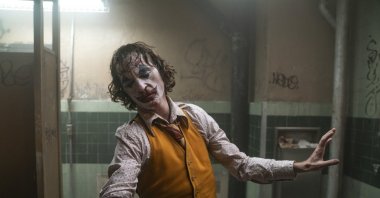 This image released by Warner Bros. Pictures shows Joaquin Phoenix in a scene from "Joker." (AP Photo)