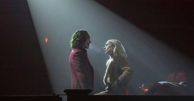 This image released by Warner Bros. Pictures shows Joaquin Phoenix (L) and Lady Gaga in a scene from "Joker: Folie a Deux." (AP Photo)