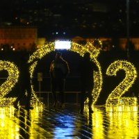 A group of friends take pictures at the 2025 New Year's decorations by the Bosporus, Istanbul, Türkiye, Dec. 29, 2024. (AA Photo)