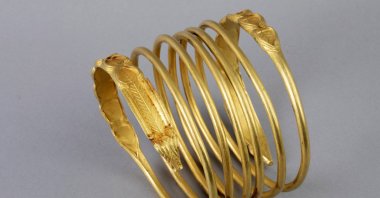 This image provided by the Drents Museum shows a Dacian golden wristband. (AP Photo)