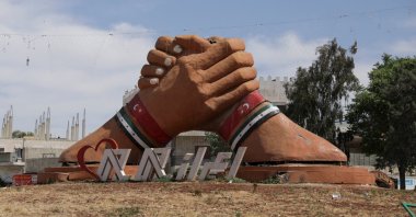A roundabout with a sculpture featuring the Turkish flag and the then-Syrian opposition flag, Azaz, Syria, May 15, 2023. (Reuters Photo)