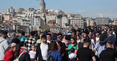 People walk during the holiday of Ramadan Bayram, also known as Eid al-Fitr, in Istanbul, Türkiye, March 31, 2025. (Reuters Photo)