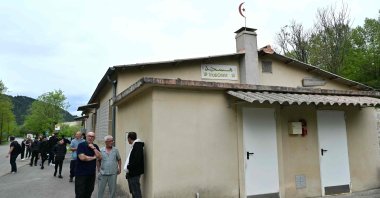 People stand outside a mosque in La Grand-Combe, southern France, April 27, 2025. (AFP Photo)