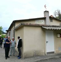 People stand outside a mosque in La Grand-Combe, southern France, April 27, 2025. (AFP Photo)