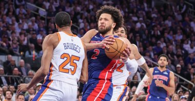 Detroit Pistons' Cade Cunningham (C) drives against New York Knicks' Mikal Bridges (L) in the fourth quarter during Game 5 of the first round for the 2025 NBA Playoffs at Madison Square Garden, New York City, U.S., April 29, 2025. (Reuters Photo)