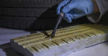 In this undated photo in an undisclosed location, an officer from the Turkish police's Trace Investigation Unit works on crime scene evidence at a laboratory. (AA Photo)