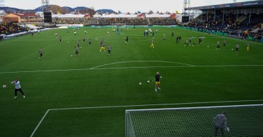 Players warm up before the first leg quarterfinal soccer match of the UEFA Europa League between Bodo/Glimt and Lazio at Aspmyra Stadium, Bodo, Norway, March 13, 2025. (AP Photo)