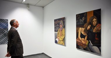 A visitor explores the artworks at the "Thinking Europe" exhibition, Brussels, Belgium, May 7, 2025. (AA Photo)