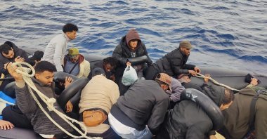 Irregular migrants are seen on a rubber boat off the coast of western Izmir province's Çeşme district, Türkiye, May 8, 2025 (AA Photo)