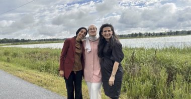 This photo provided by the Öztürk legal team shows Rümeysa Öztürk (C) with Nora Ahmed of ACLU Louisiana and Mahsa Khanbabai of Khanbabai Law, shortly after her release from an immigration detention center, in Basille, Louisiana, U.S., May 9, 2025. (AP Photo)