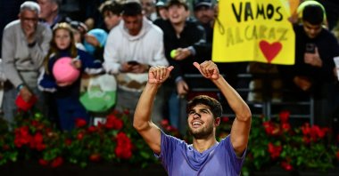 Spain's Carlos Alcaraz celebrates after winning his men's singles match against Serbia's Laslo Djere during the ATP Rome Open tennis tournament at Foro Italico, Rome, Italy, May 11, 2025. (AFP Photo)