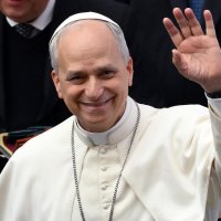 Pope Leo XIV waves during an audience with members of the media at the Paul VI Audience Hall in Vatican City, May 12, 2025. (EPA Photo)