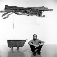 Artist Robert Rauschenberg with his art at the Museum of Modern Art, New York, U.S., March 19, 1977. (Getty Images)