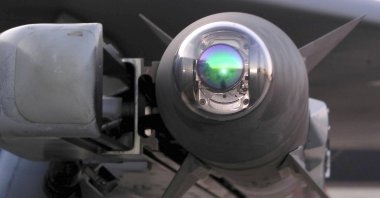 A Raytheon-built AIM-9X Sidewinder infrared-guided air-to-air missile is mounted on one of the 3rd Wing's F-15C Eagle jets at Elmendorf Air Force Base, Alaska, on Sept. 26, 2003. (AP File Photo)