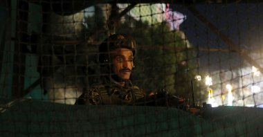 An Indian paramilitary soldier maintains vigil from his post at Lal Chowk, the city center in Srinagar, India-ruled Kashmir, May 14, 2025. (EPA Photo)