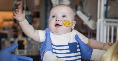 This photo provided by the Children's Hospital of Philadelphia shows K.J. Muldoon after a follow up dose of an experimental gene editing treatment at the hospital in April 2025. (AP Photo)