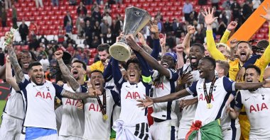 Tottenham Hotspur's players celebrate with the trophy after their win against Manchester United in the Europa League final match held at San Mames stadium, Bilbao, Spain, May 21, 2025. (AA Photo)