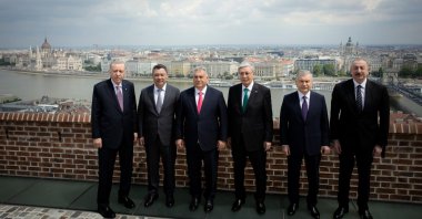 Leaders of the Organization of Turkic States (OTS), including President Recep Tayyip Erdoğan, pose for a photo during the summit, with the Danube River in the background, Budapest, Hungary, May 21, 2025. (AA Photo)