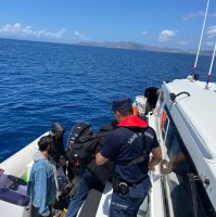 The coast guard rescues migrants in southern Muğla province, Türkiye, May 20, 2025 (AA Photo)