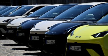 BYD Dolphin Surf electric cars are parked in front of the venue where BYD carmaker holds a vehicle presentation event, Berlin, Germany, May 21, 2025. (Reuters Photo)