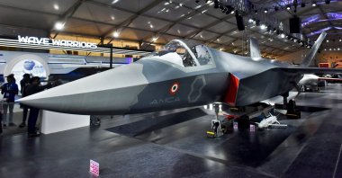 Visitors stand next to a prototype of the Advanced Medium Combat Aircraft (AMCA), India's most advanced stealth fighter jet, at the "Aero India 2025" air show, Yelahanka air base in Bengaluru, India, Feb. 11, 2025. (Reuters Photo)