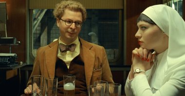 Michael Cera (L) and Mia Threapleton in a scene from "The Phoenician Scheme." (Focus Features via AP Photo)