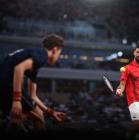 A ball boy passes a ball to Serbia's Novak Djokovic before serving to Austria's Filip Misolic during their men's singles match on day 7 of the French Open tennis tournament on Court Philippe-Chatrier at the Roland-Garros Complex, Paris, France, May 31, 2025. (AFP Photo)
