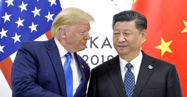 President Donald Trump (L) shakes hands with China's President Xi Jinping during a meeting on the sidelines of the G-20 summit in Osaka, Japan, June 29, 2019. (AP Photo)
