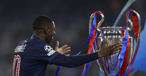 Paris Saint-Germain's Ousmane Dembele with the trophy after collecting his Champions League winner's medal at the Allianz Arena, Munich, Germany, May 31, 2025. (Reuters Photo)