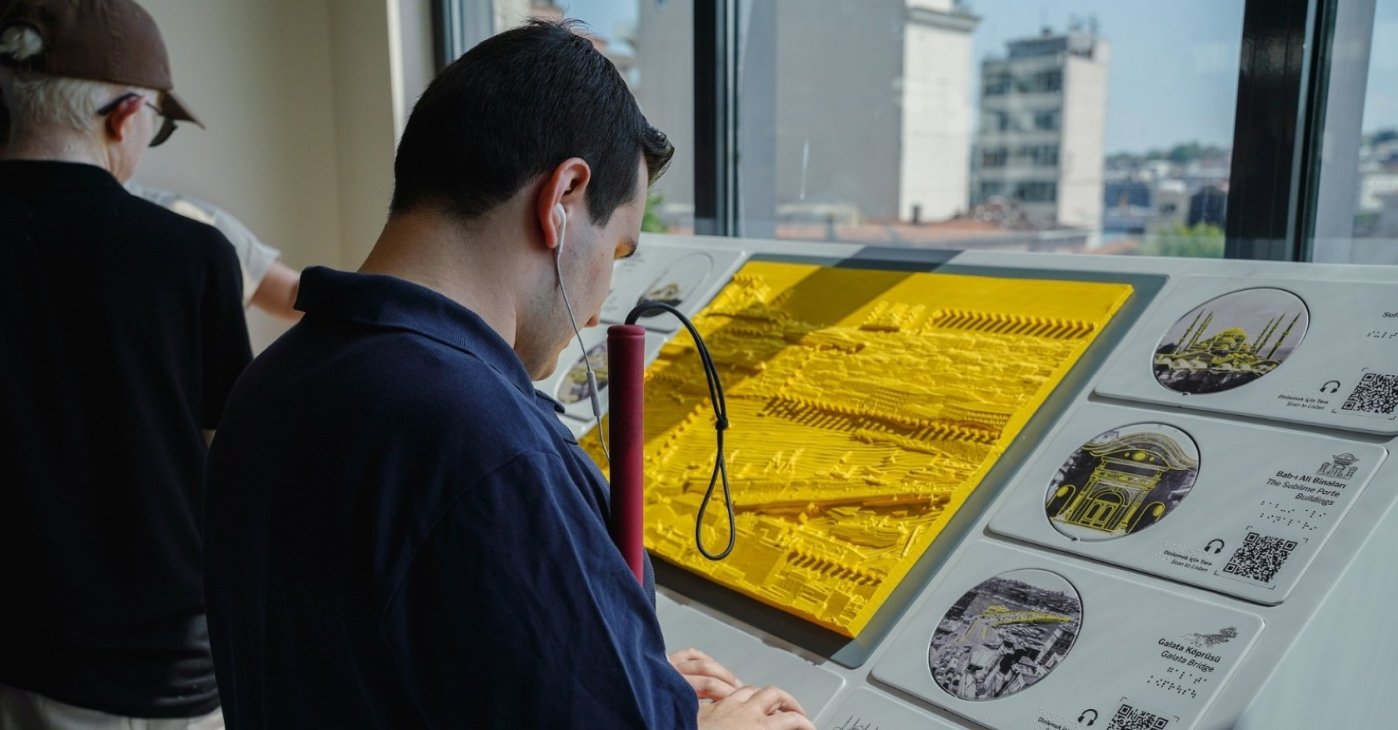 A visitor explores the "Inclusive Experience" station at Salt Galata, Istanbul, Türkiye, May 27, 2025. (Photo by Selen Başman)